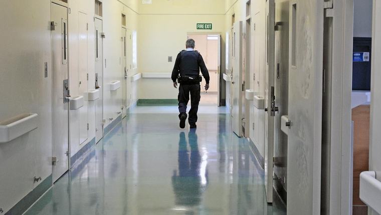 Prison officer who repeatedly kicked restrained inmates fails to get job back