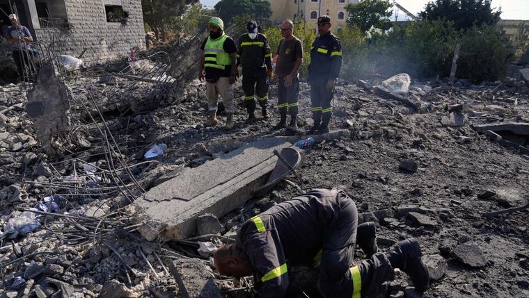 Israeli airstrikes on a village in southern Lebanon kill 9 people, wound 13