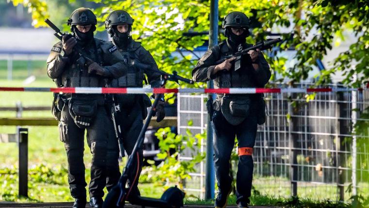 One dead, person on run after shooting at rave in Switzerland